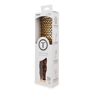 TELETIES vented hair brush in tortoise pattern displayed in white retail packaging box.