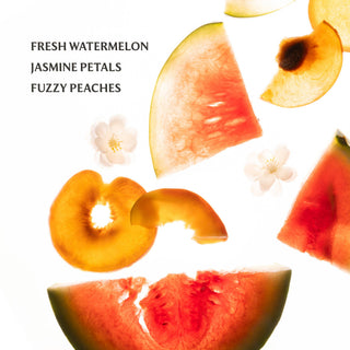 Fresh fruit slices including watermelon, peach, and jasmine flowers on white background showcasing product ingredients.